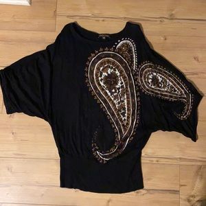Black sweater with a paisley design.